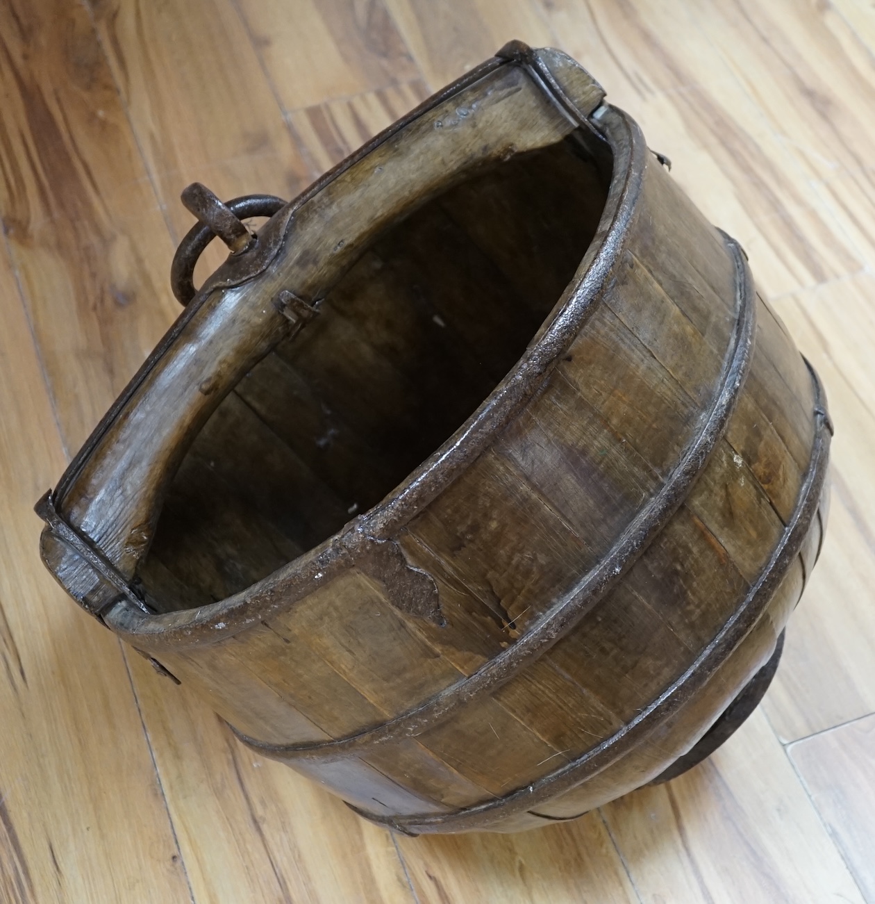 A Chinese coopered well bucket, 60cm high. Condition- fair to good